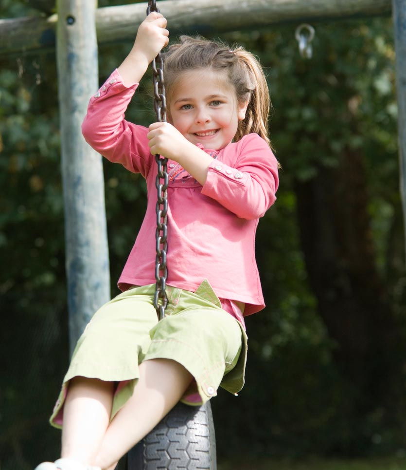 A kid swinging